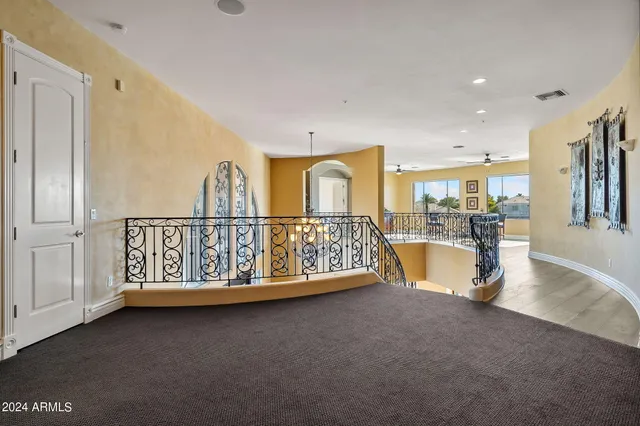 a kitchen with stainless steel appliances granite countertop a stove top oven a sink a counter space and cabinets