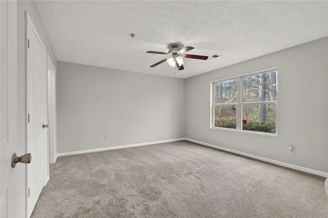 wooden floor in an empty room and a window