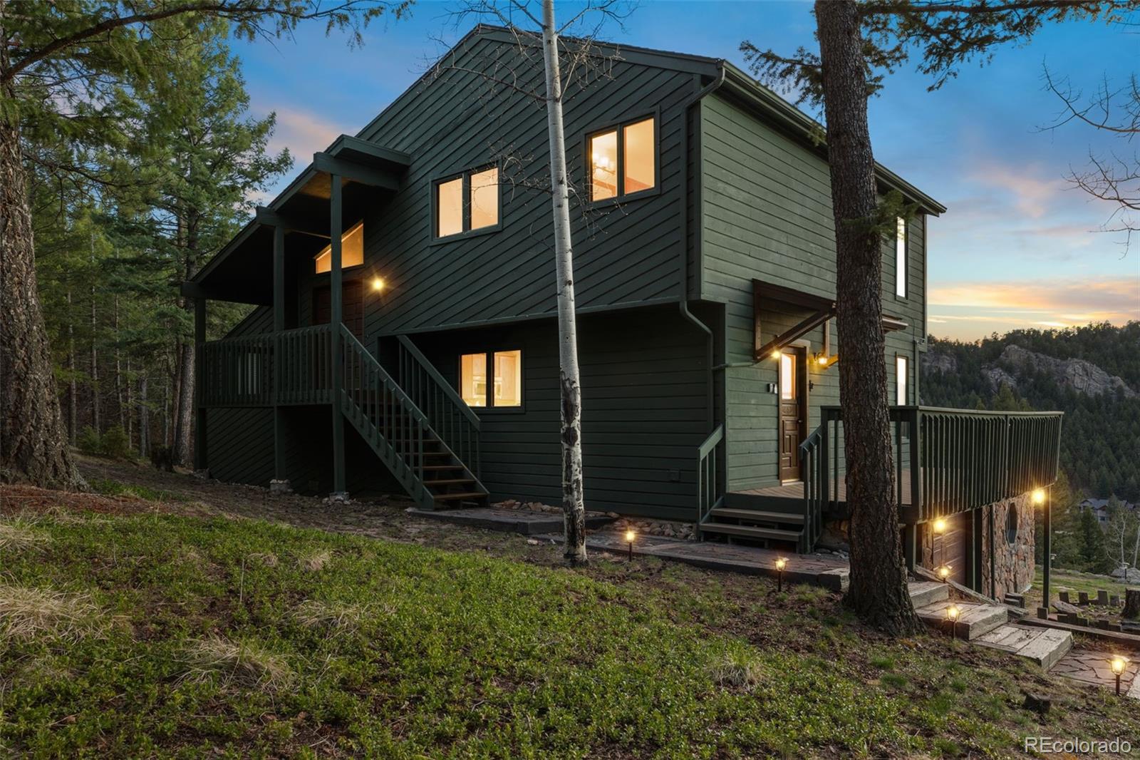 25756 Zugspitz Road Evergreen, CO 80439 - Photo 35 of 43 a view of backyard of house