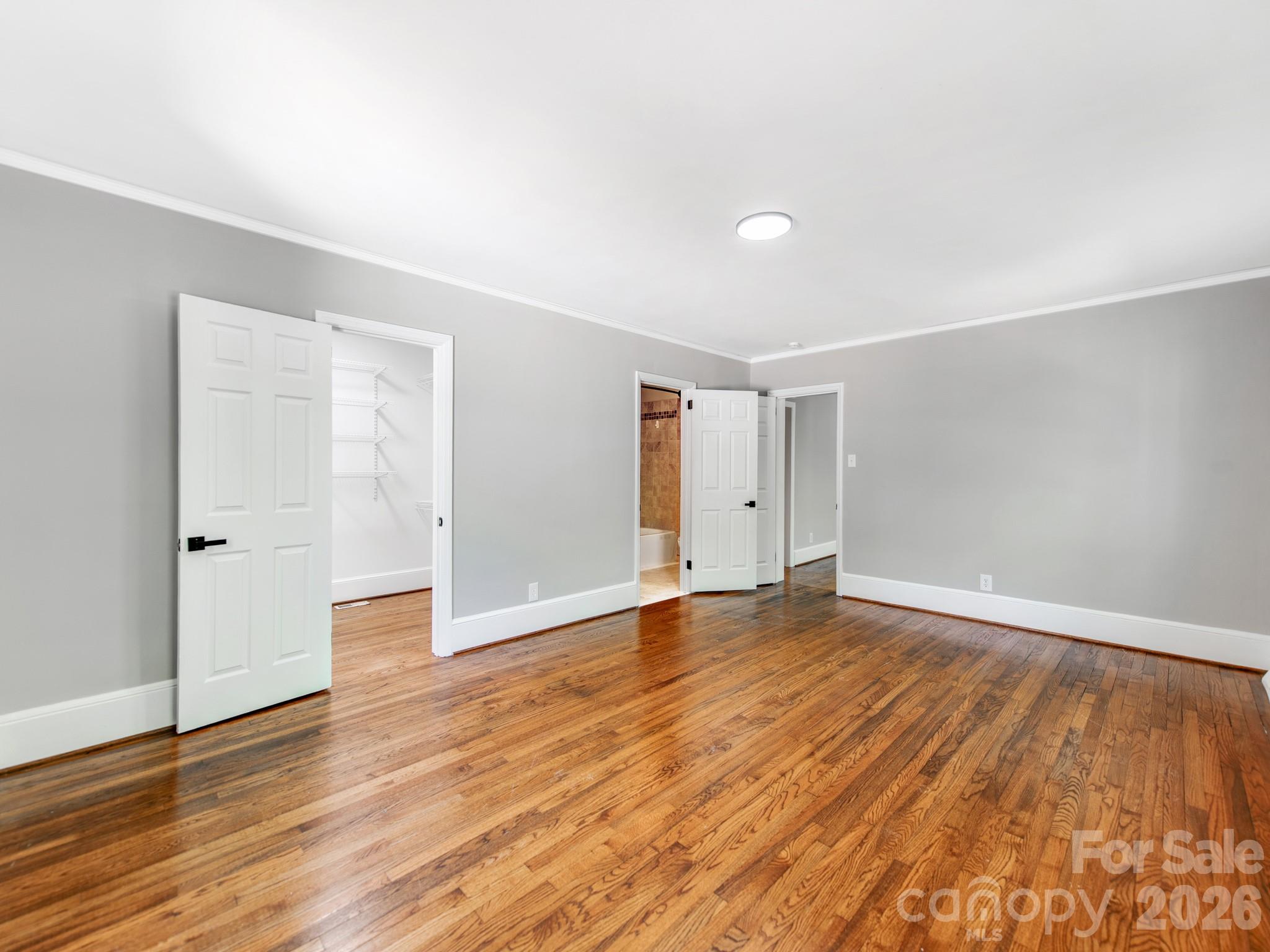 120 Sunset Drive Chester, SC 29706 - Photo 18 of 34 a view of an empty room with wooden floor and closet