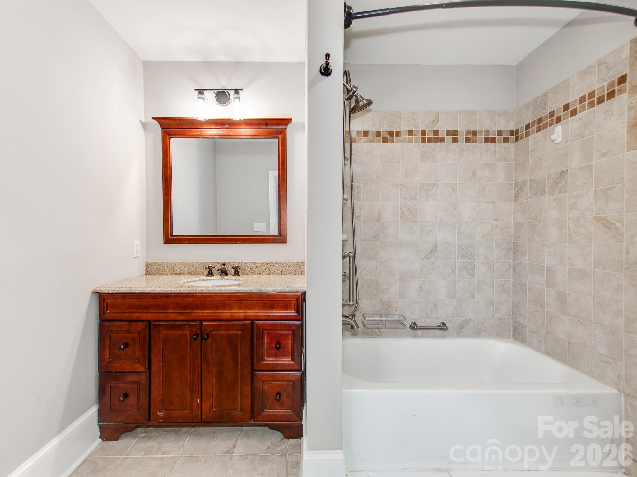 120 Sunset Drive Chester, SC 29706 - Photo 19 of 34 a bathroom with a sink and a mirror
