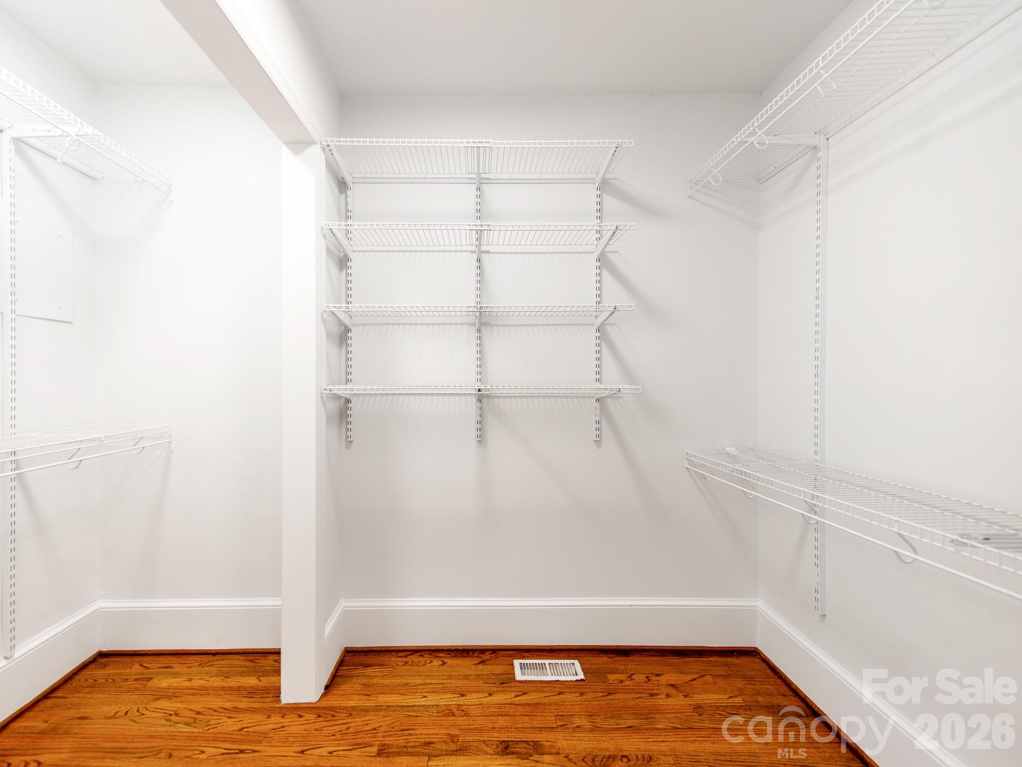 120 Sunset Drive Chester, SC 29706 - Photo 20 of 34 a view of walk in closet with empty racks