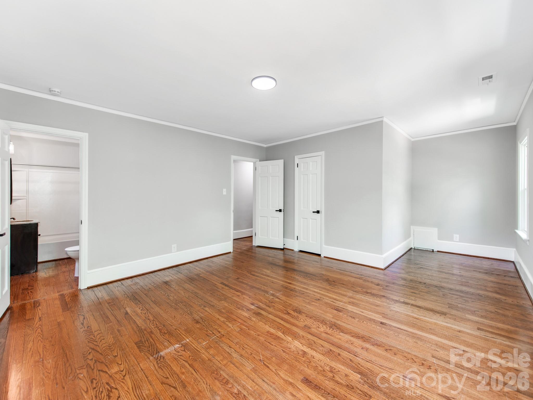 120 Sunset Drive Chester, SC 29706 - Photo 22 of 34 a view of an empty room with wooden floor