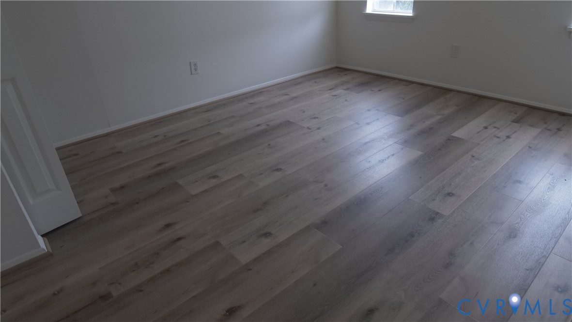419 Roxana Road Henrico, VA 23075 - Photo 21 of 56 a view of a room with wooden floor and window