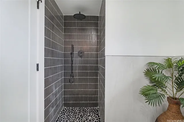 a utility room with sink dryer and washer