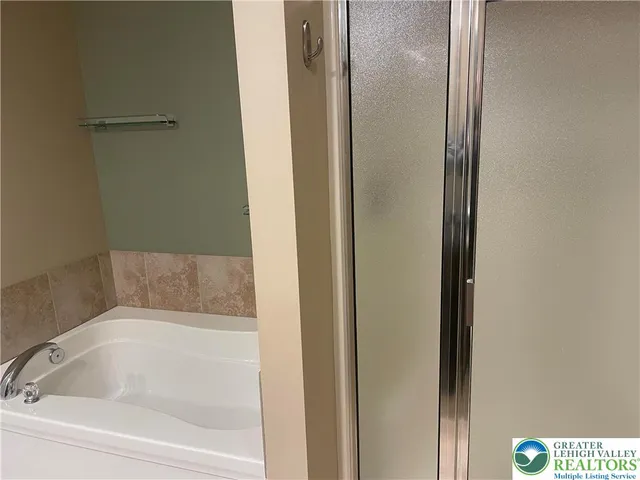 a close view of a bathtub in bathroom