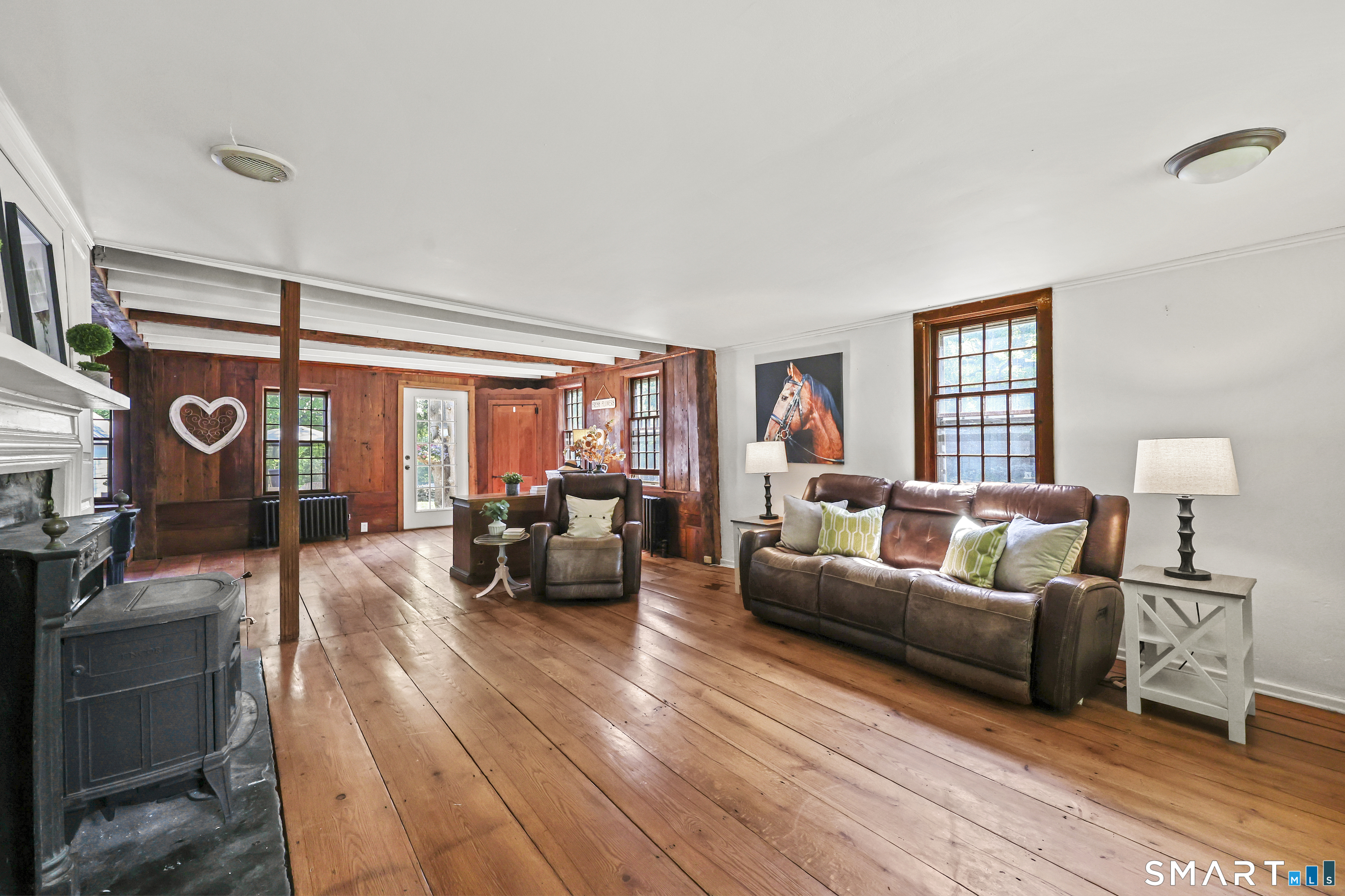 2880 Main Street Coventry, CT 06238 - Photo 16 of 40 Gorgeously scaled living room with wide plank flooring.