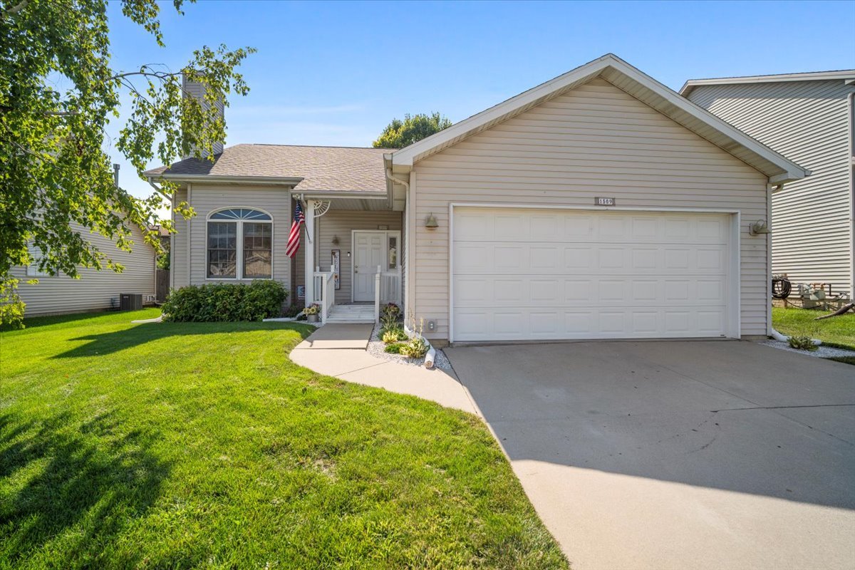 1509 Torrey Pines Road Normal, IL 61761 - Photo 1 of 36 a front view of a house with garden