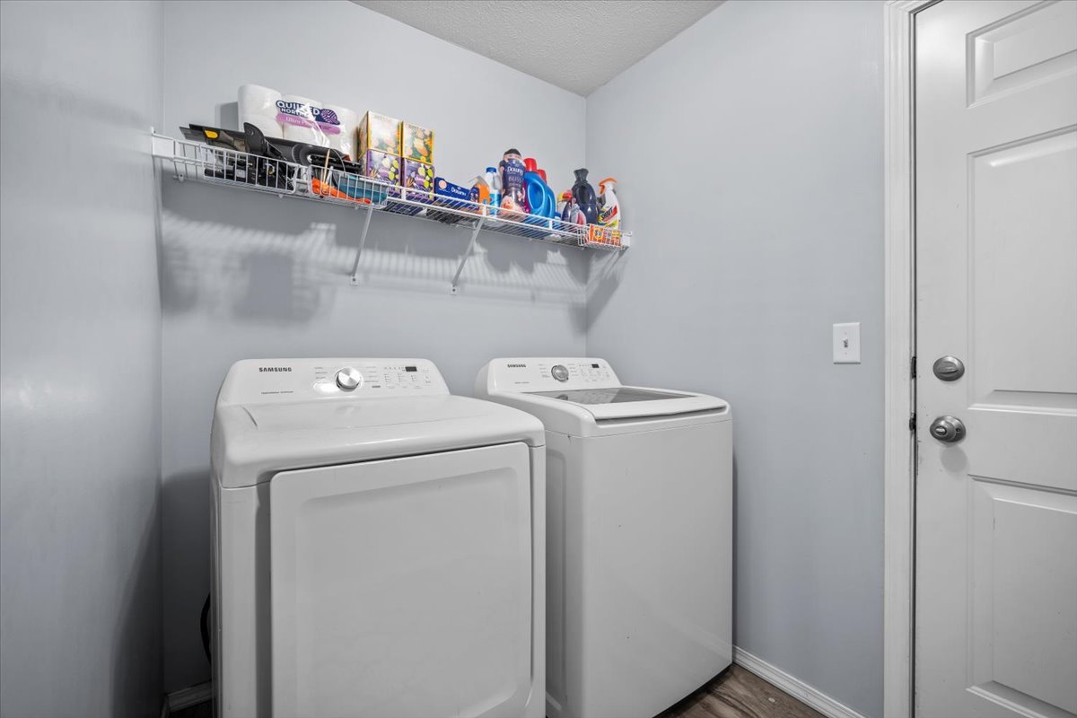 1509 Torrey Pines Road Normal, IL 61761 - Photo 17 of 36 a utility room with dryer and washer