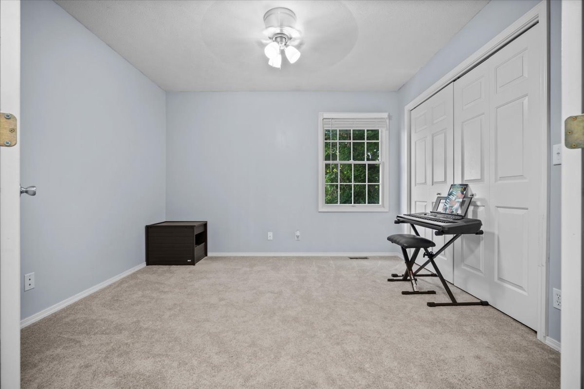 1509 Torrey Pines Road Normal, IL 61761 - Photo 23 of 36 a workspace with furniture and windows
