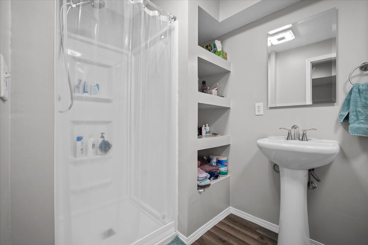 1509 Torrey Pines Road Normal, IL 61761 - Photo 28 of 36 a bathroom with a sink and mirror