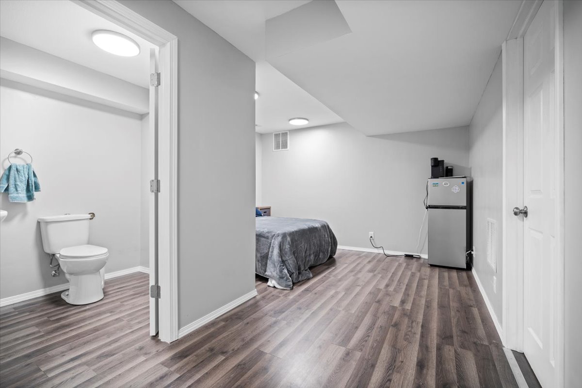 1509 Torrey Pines Road Normal, IL 61761 - Photo 29 of 36 a bedroom with a bed and a view of bathroom