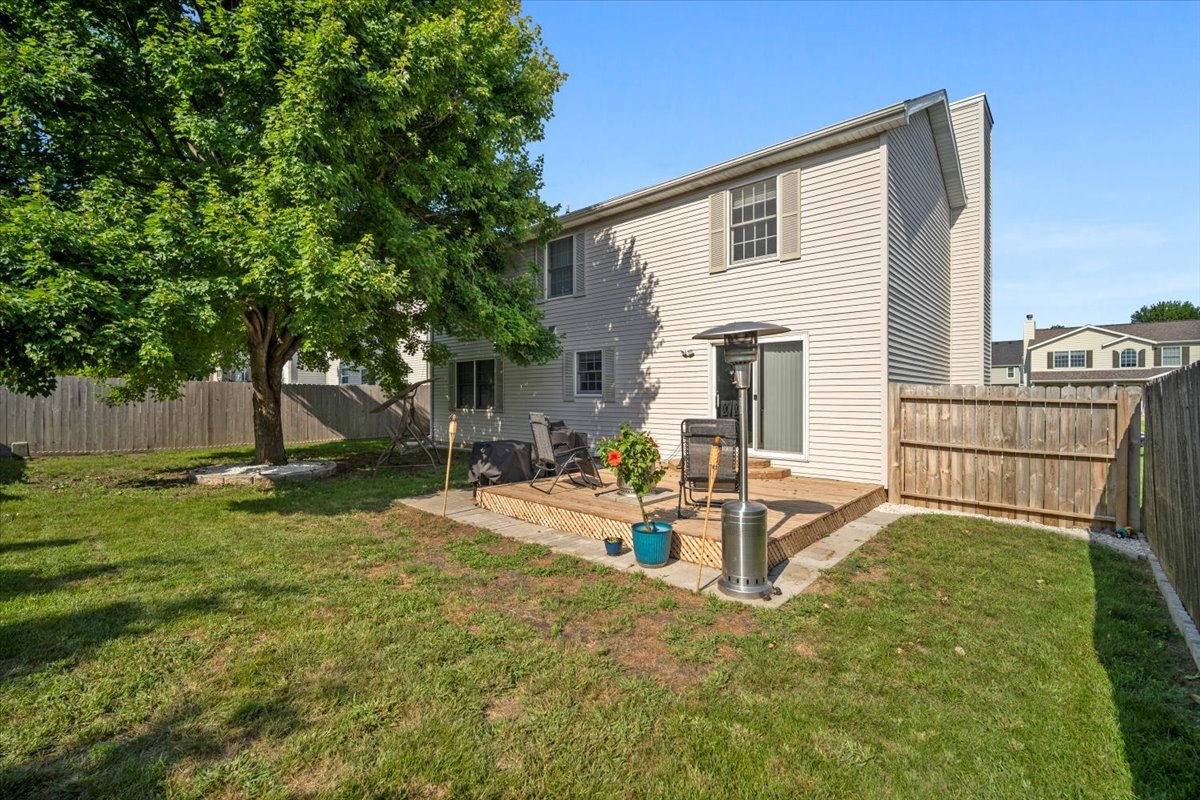 1509 Torrey Pines Road Normal, IL 61761 - Photo 33 of 36 a view of a house with backyard and sitting area