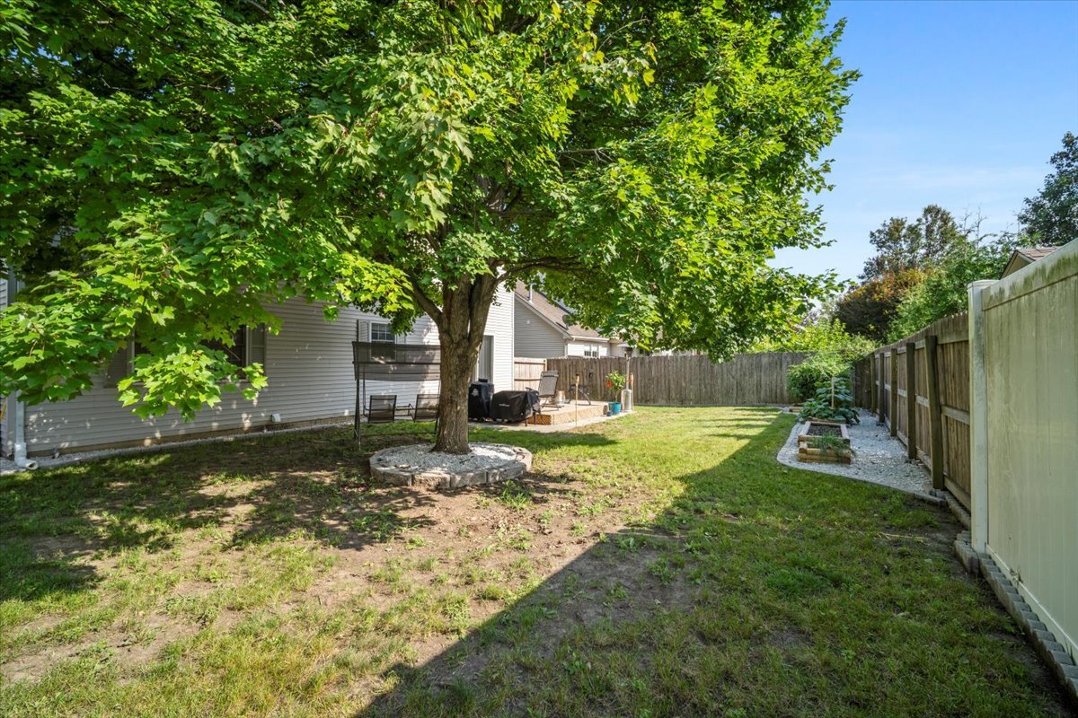 1509 Torrey Pines Road Normal, IL 61761 - Photo 34 of 36 a view of backyard of house with green space
