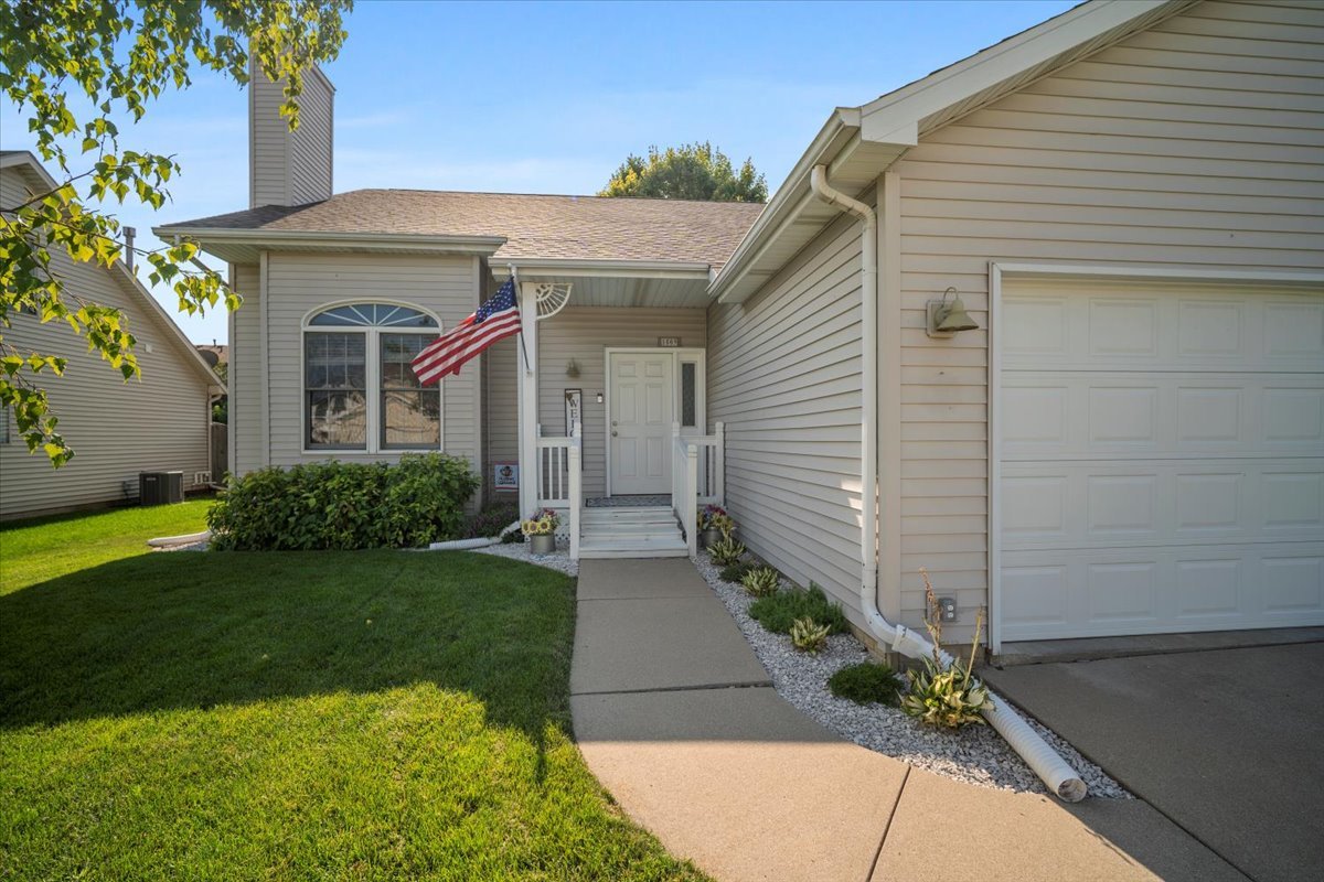 1509 Torrey Pines Road Normal, IL 61761 - Photo 35 of 36 a front view of a house with garden