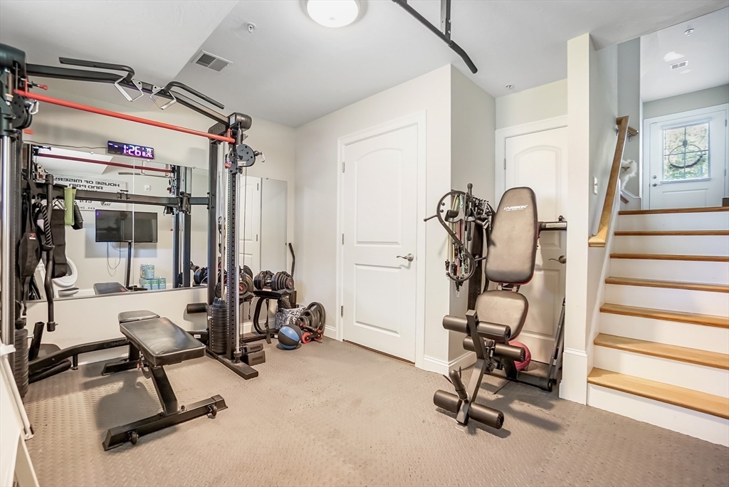 55 Plymouth Street, Unit A5 Whitman, MA 02382 - Photo 23 of 34 a view of a room with gym equipment