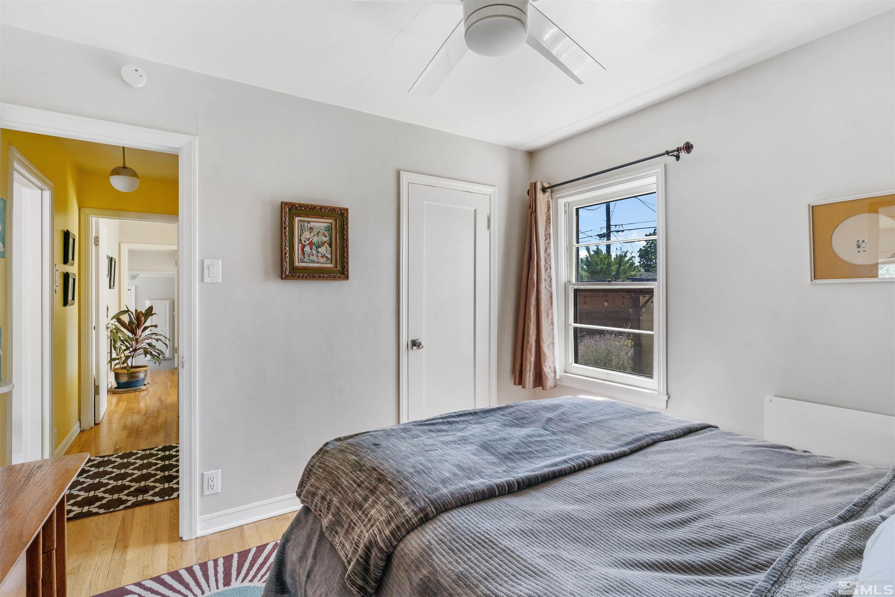 704 Balzar Circle Reno, NV 89502 - Photo 17 of 32 a bedroom with a bed and a window
