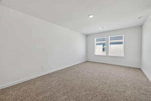 a bathroom with a sink toilet and vanity