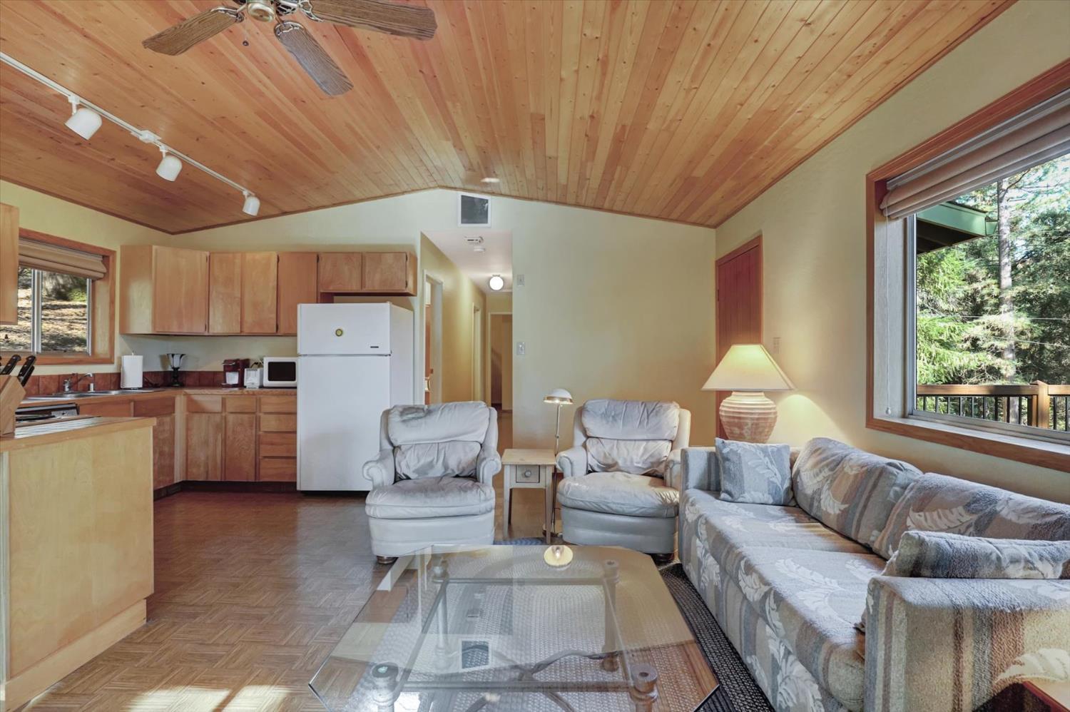 17028 Banner Quaker Hill Road Nevada City, CA 95959 - Photo 13 of 79 a living room with furniture and a large window