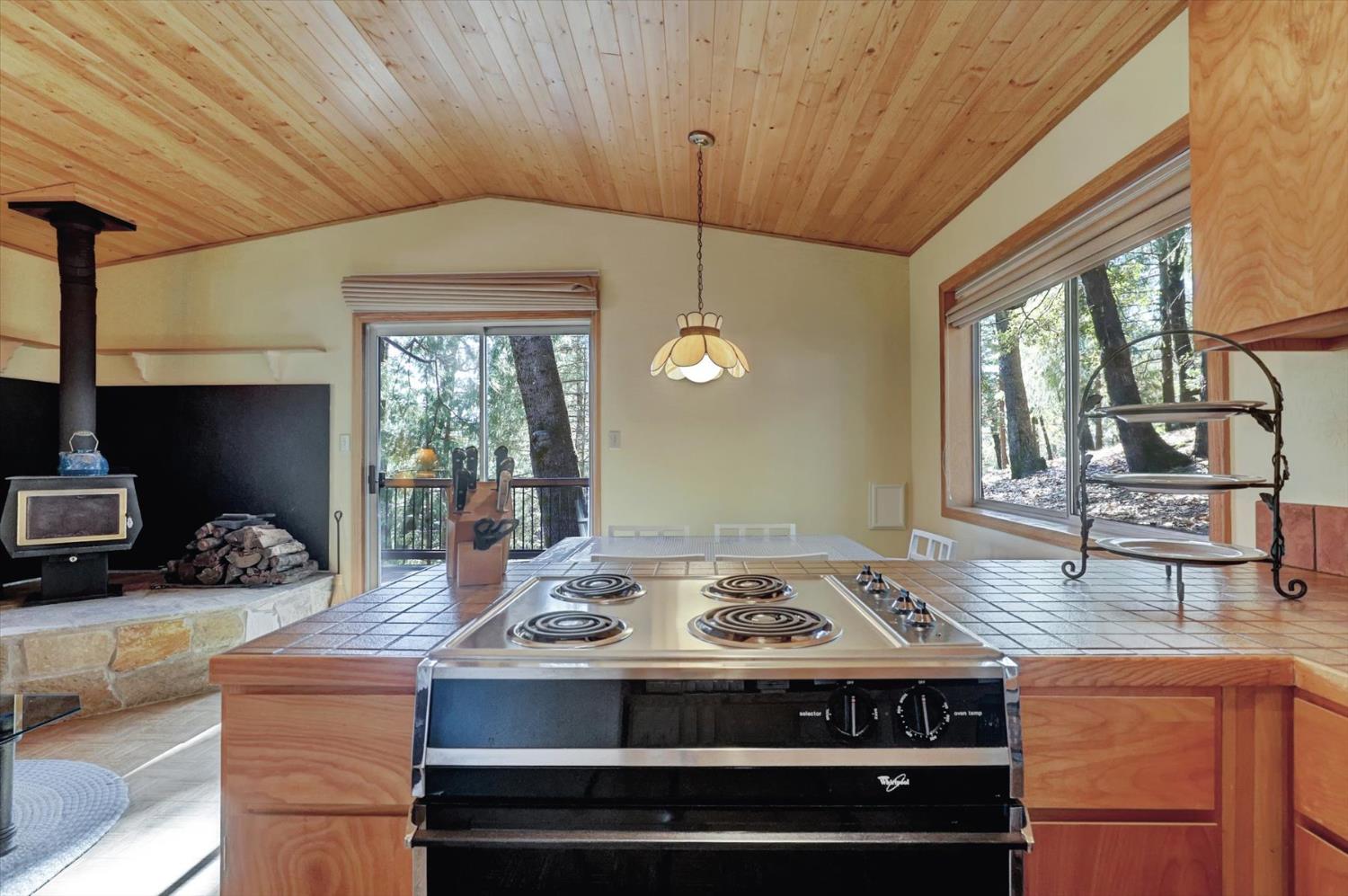 17028 Banner Quaker Hill Road Nevada City, CA 95959 - Photo 20 of 79 a kitchen with a stove and a sink