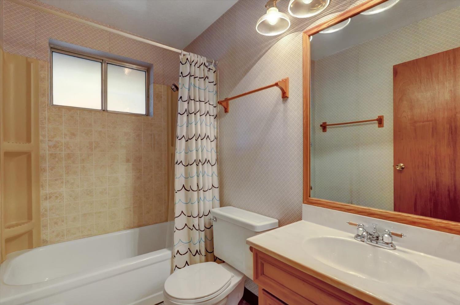 17028 Banner Quaker Hill Road Nevada City, CA 95959 - Photo 23 of 79 a bathroom with a sink toilet tub and shower