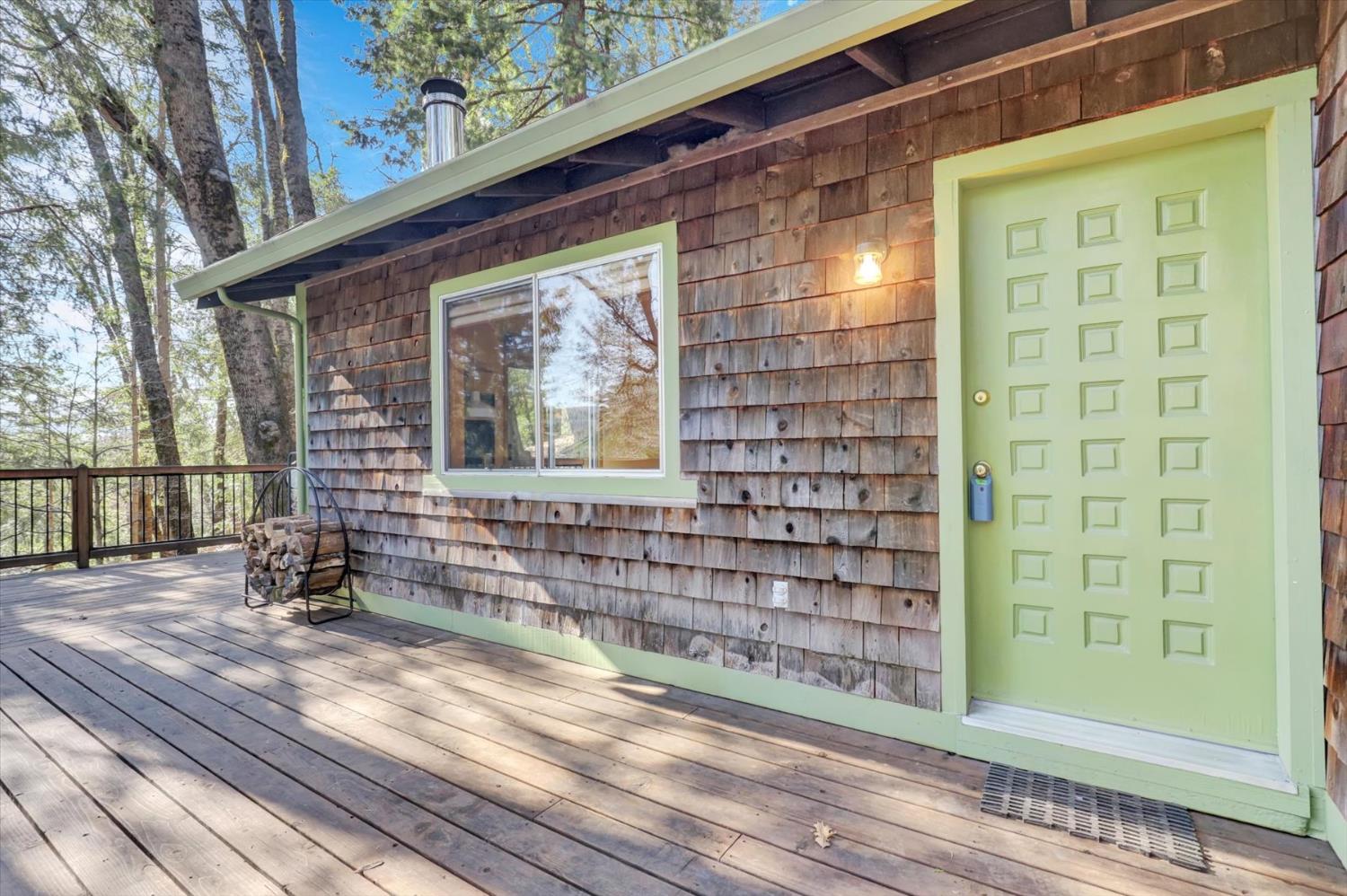17028 Banner Quaker Hill Road Nevada City, CA 95959 - Photo 37 of 79 a view of front door of house with wooden floor