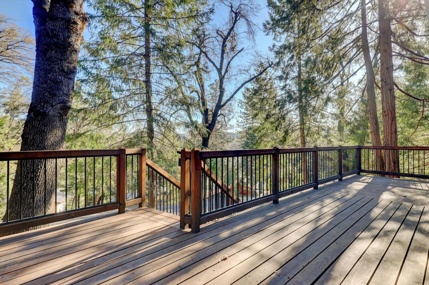 17028 Banner Quaker Hill Road Nevada City, CA 95959 - Photo 40 of 79 a view of balcony with wooden floor and fence