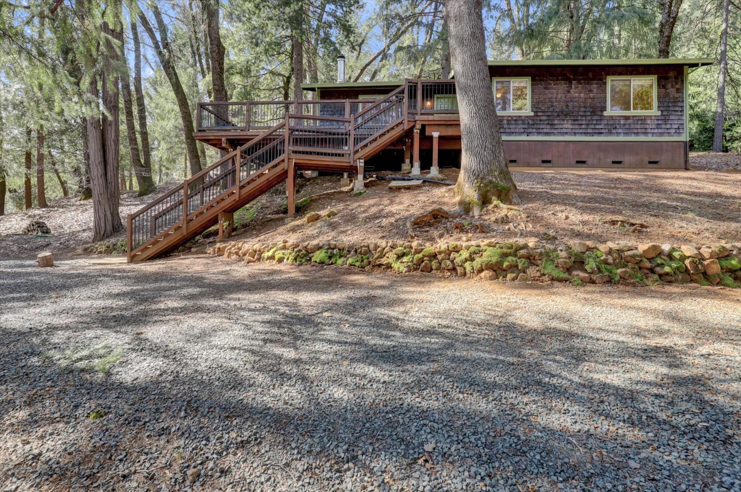 17028 Banner Quaker Hill Road Nevada City, CA 95959 - Photo 54 of 79 front view of a house with a yard