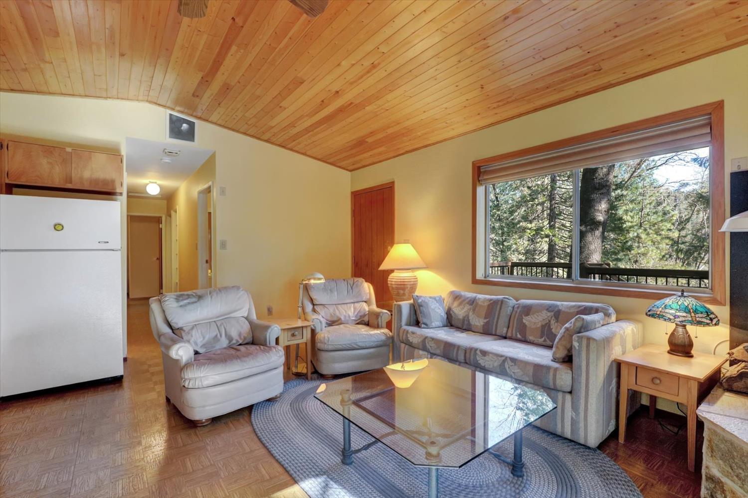 17028 Banner Quaker Hill Road Nevada City, CA 95959 - Photo 7 of 79 a living room with furniture and a large window