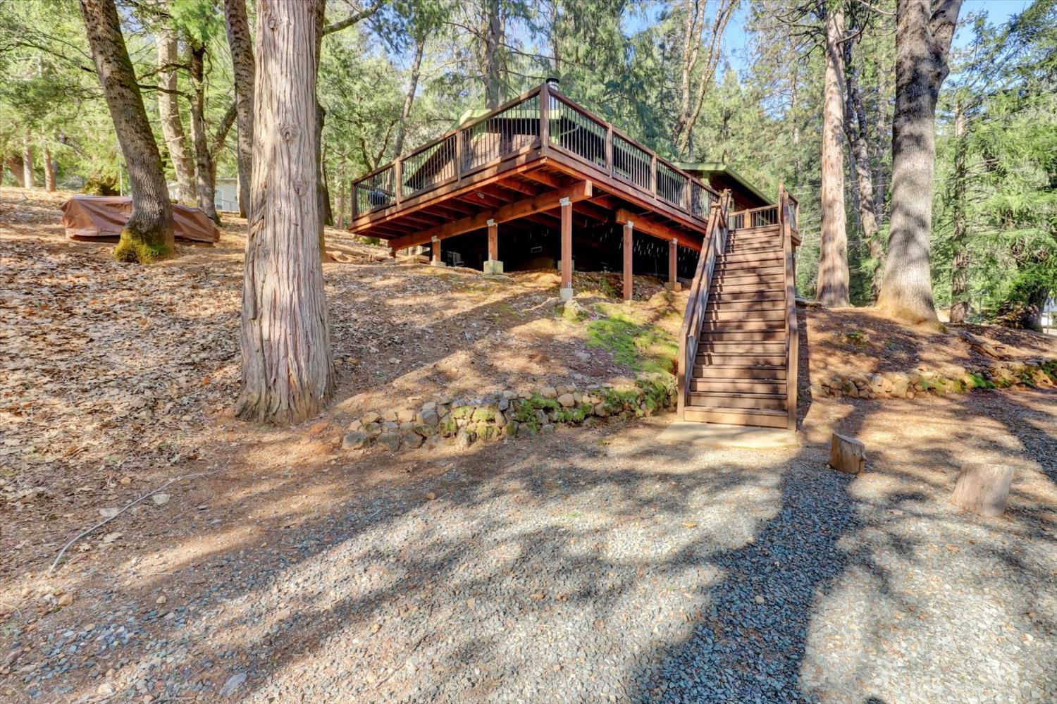 17028 Banner Quaker Hill Road Nevada City, CA 95959 - Photo 77 of 79 a front view of a house with a yard