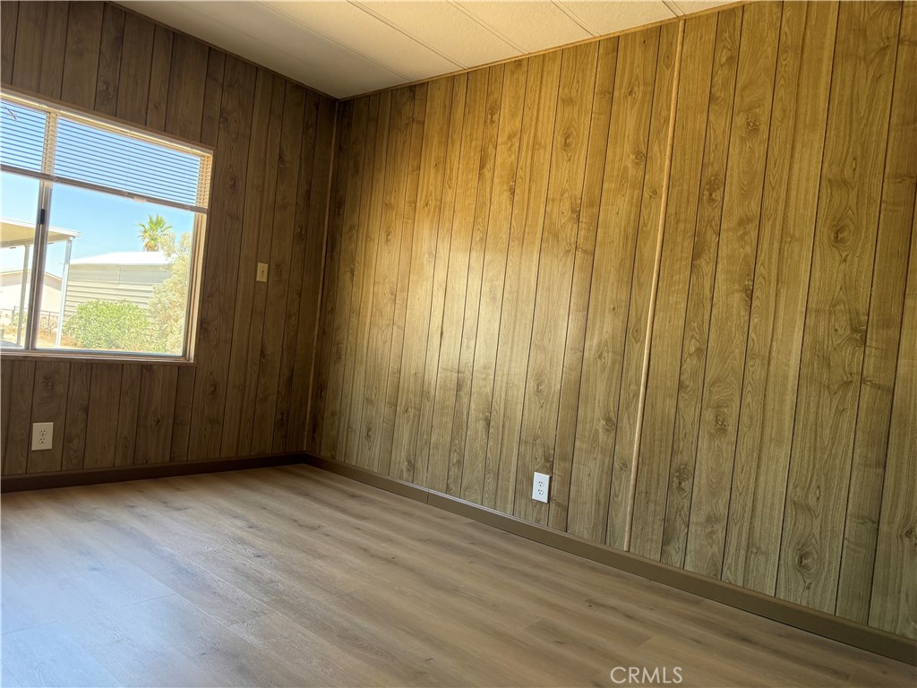 148600 Panoply Road Needles, CA 92363 - Photo 11 of 32 a view of an empty room with wooden walls