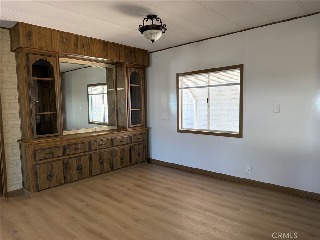 148600 Panoply Road Needles, CA 92363 - Photo 22 of 32 a view of a big room with windows and chandelier