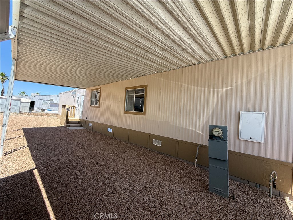 148600 Panoply Road Needles, CA 92363 - Photo 6 of 32 a workspace with furniture and window