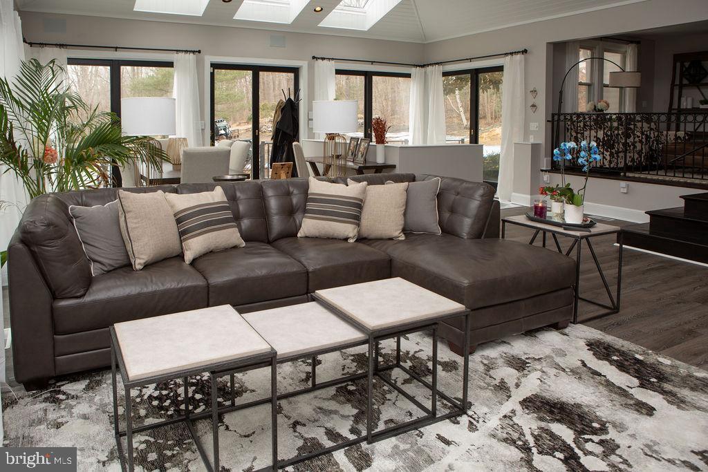 15841 York Road Sparks, MD 21152 - Photo 3 of 22 a living room with furniture potted plant and windows