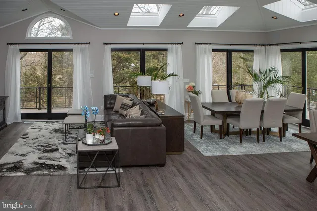 a living room with furniture or window and a table