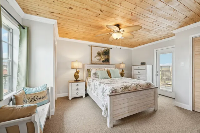 a bed room with a bed and a couch