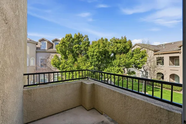 a view of a balcony with city view