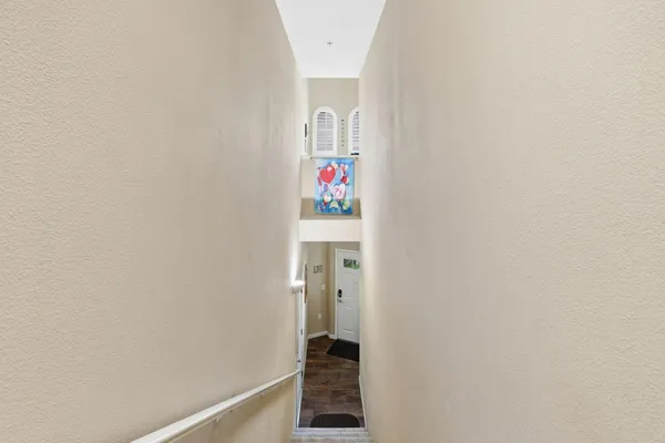 a view of hallway with stairs