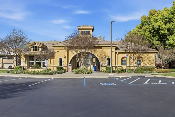 a view of a building with a street