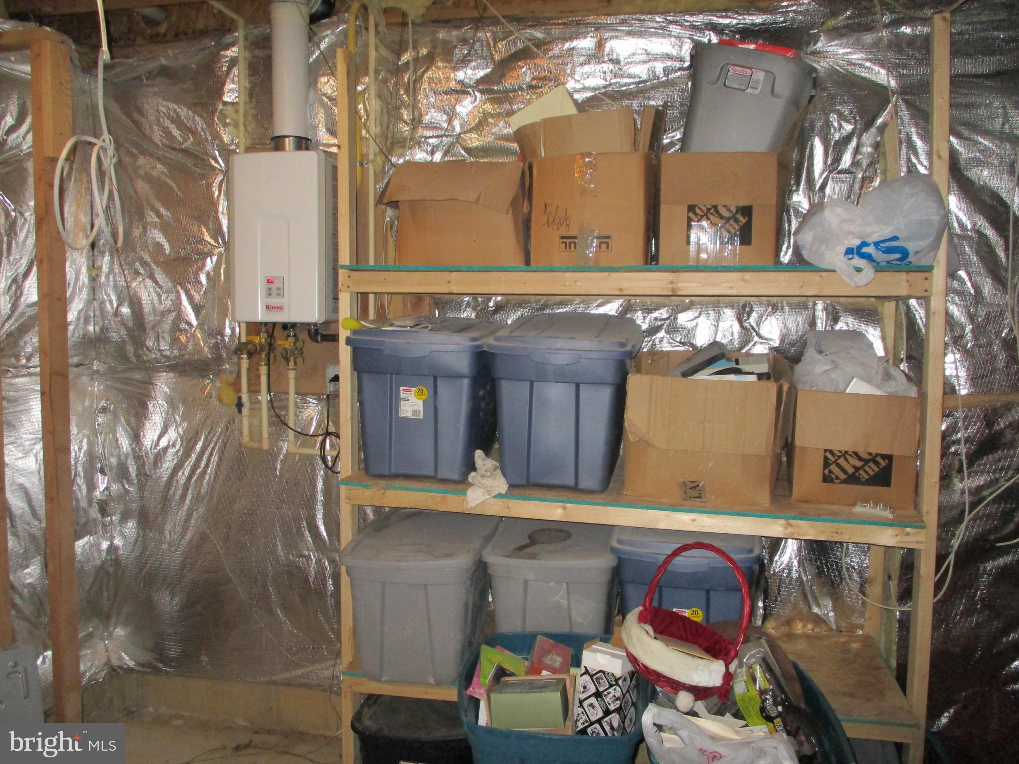 11041 Knights Road Philadelphia, PA 19154 - Photo 46 of 50 Tankless Hot Water Heater in Basement Storage Room