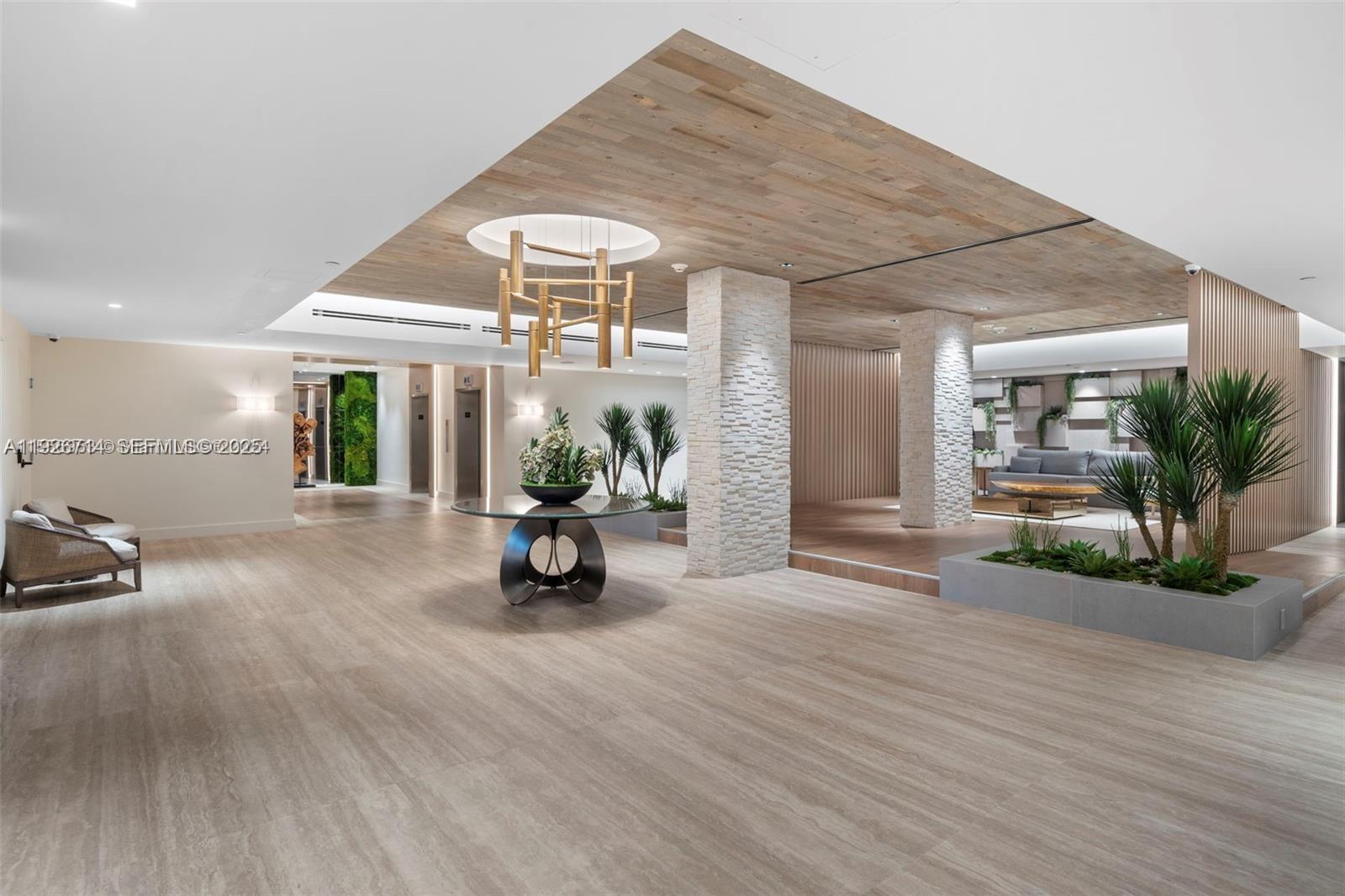 2301 Collins Avenue, Unit 1625 Miami Beach, FL 33139 - Photo 12 of 19 a view of an entryway with wooden floor