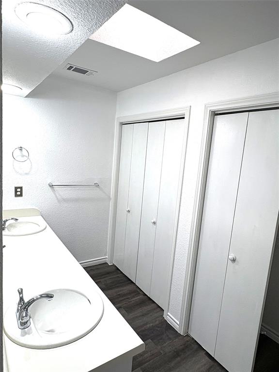 7060 Jay Lane Azle, TX 76020 - Photo 13 of 36 a bathroom with a sink and a mirror