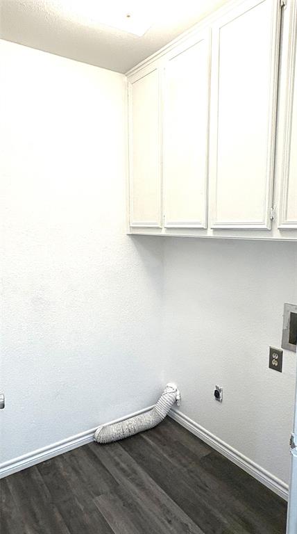 7060 Jay Lane Azle, TX 76020 - Photo 14 of 36 an empty room with wooden floor and cabinets