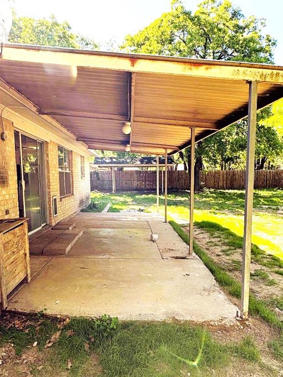 7060 Jay Lane Azle, TX 76020 - Photo 15 of 36 a view of a swimming pool with an outdoor seating and a yard
