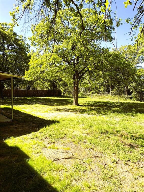 7060 Jay Lane Azle, TX 76020 - Photo 16 of 36 a view of swimming pool with an outdoor space and seating area