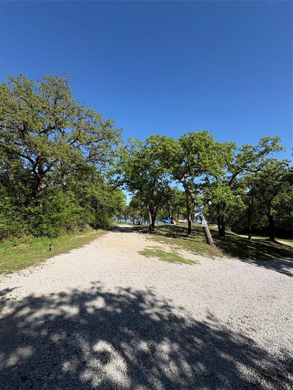 7060 Jay Lane Azle, TX 76020 - Photo 21 of 36 a view of a yard with a house