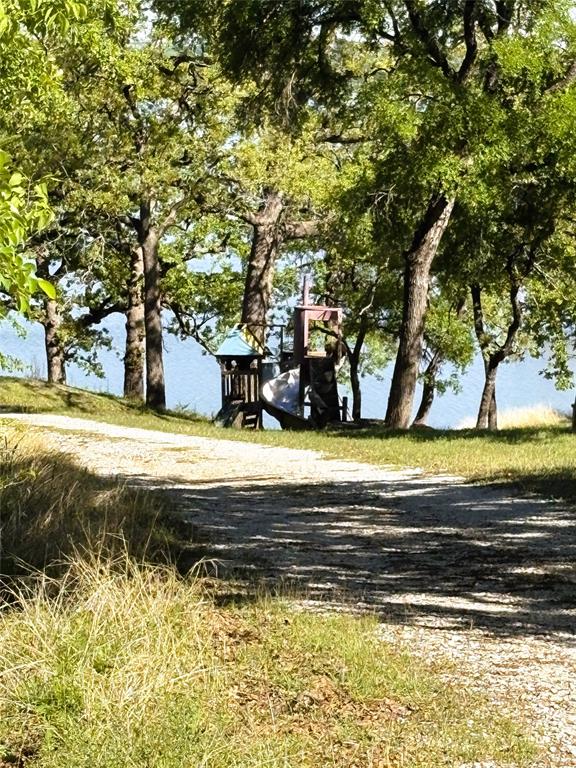 7060 Jay Lane Azle, TX 76020 - Photo 22 of 36 a view of swimming pool with an outdoor space
