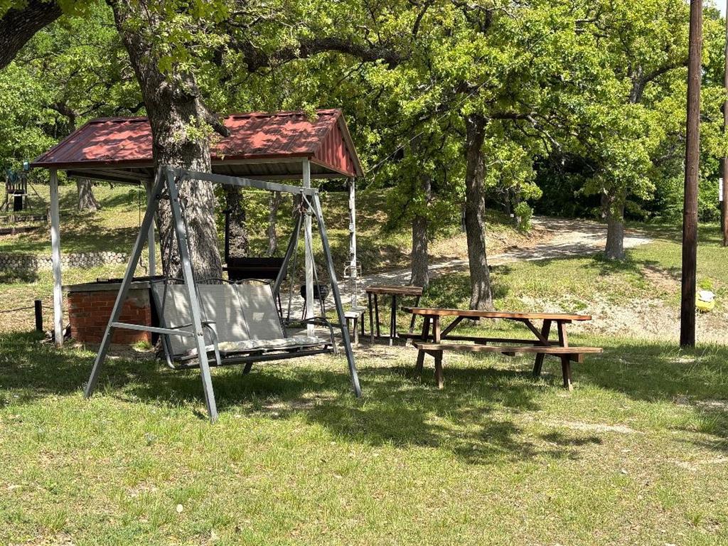 7060 Jay Lane Azle, TX 76020 - Photo 35 of 36 Covered Swings ~ Great For Swingin' & Dozin'! How Fun!!