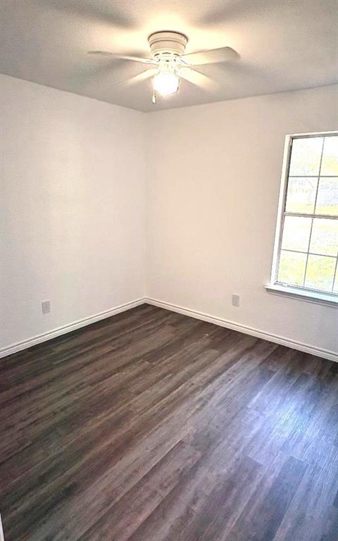 7060 Jay Lane Azle, TX 76020 - Photo 9 of 36 a view of a room that has wooden floor and windows in it