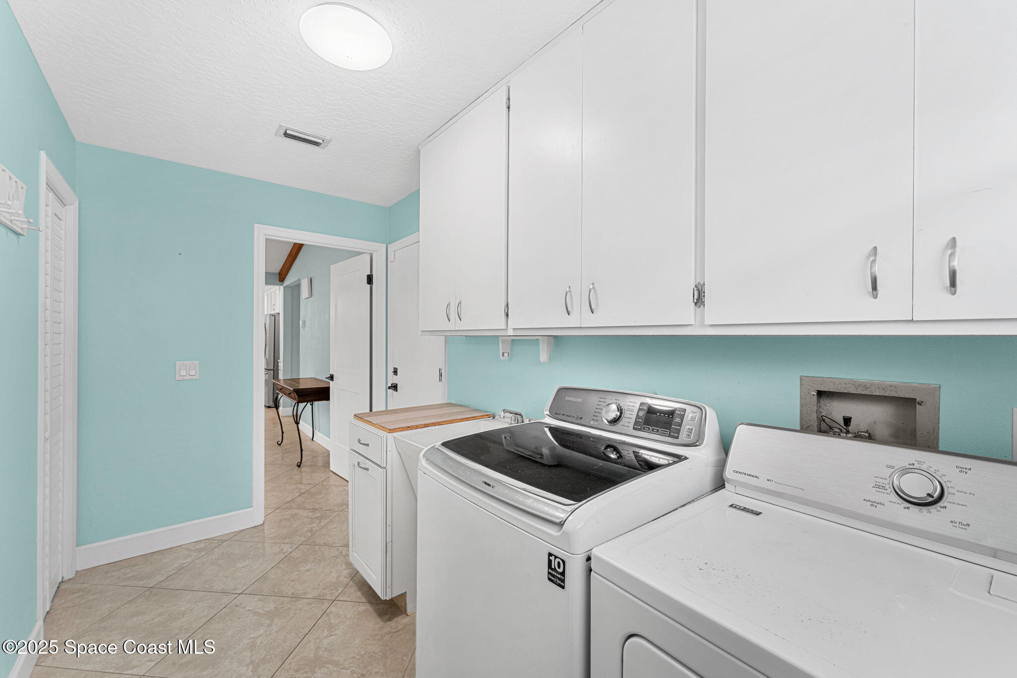 615 Mark And Randy Drive Satellite Beach, FL 32937 - Photo 30 of 40 a view of kitchen and sink